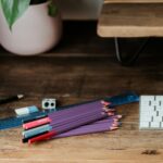 coloring pencils on brown wooden table